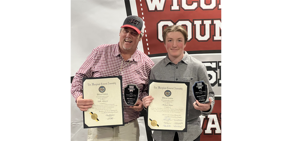 Player of the Year Michael Baim and Coach of the Year Bill Atkinson